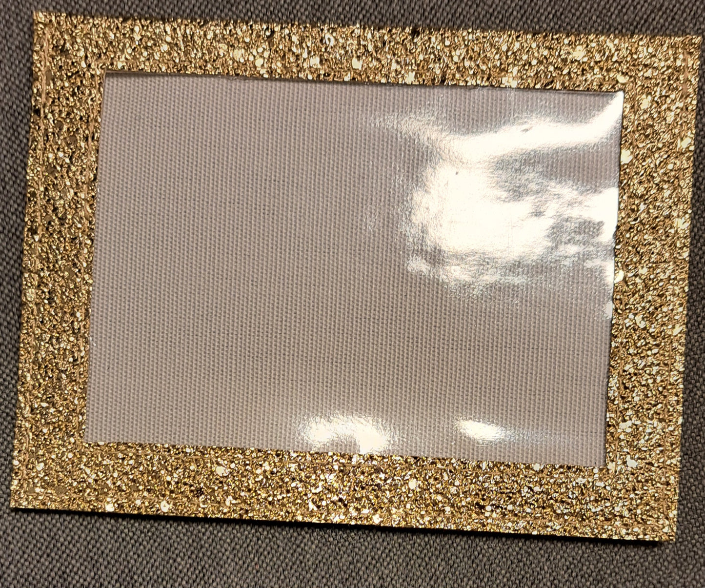 Glittrig kardborreficka utan armband