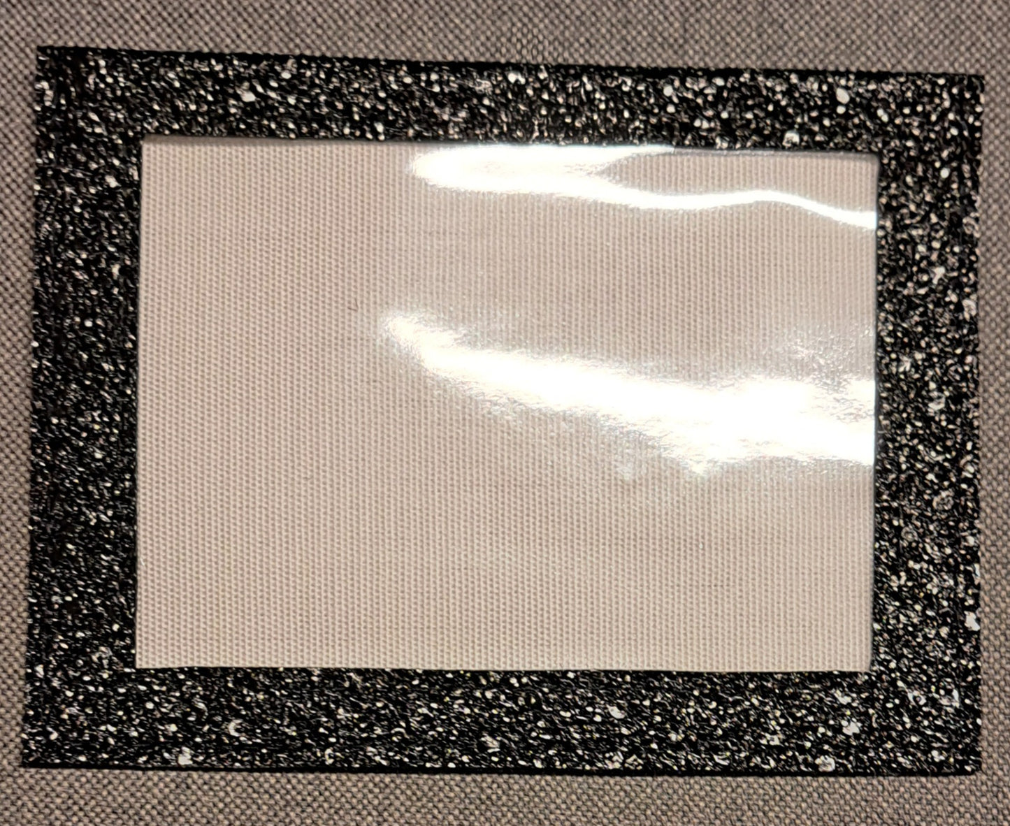 Glittrig kardborreficka utan armband